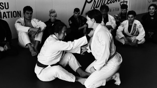 To Win or Learn? Competing Commitments